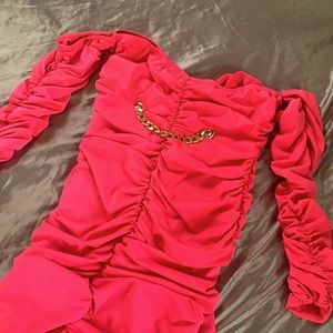 I am selling a bright magenta dress